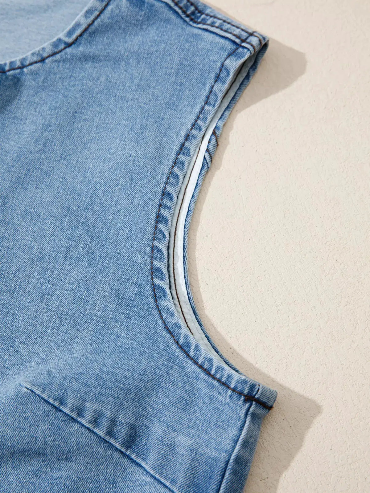 Slim Fit Button Front Denim Vest in blue denim with white piping trim