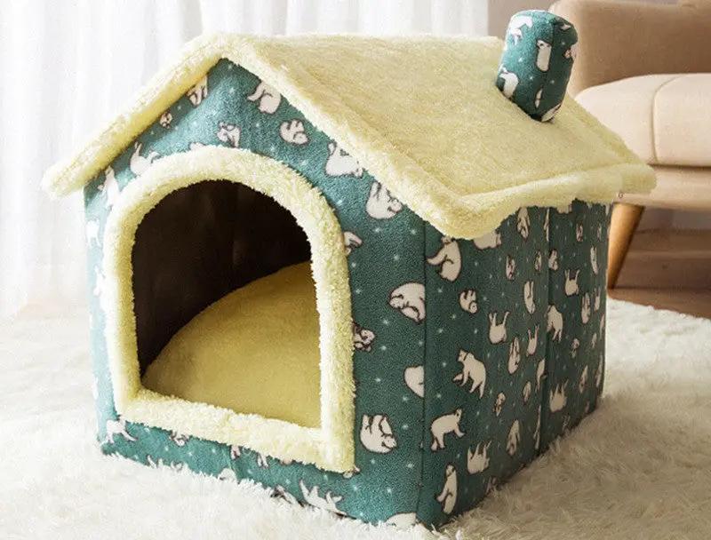 Foldable AdTec pet house in teal with plush yellow interior and cave-style entrance