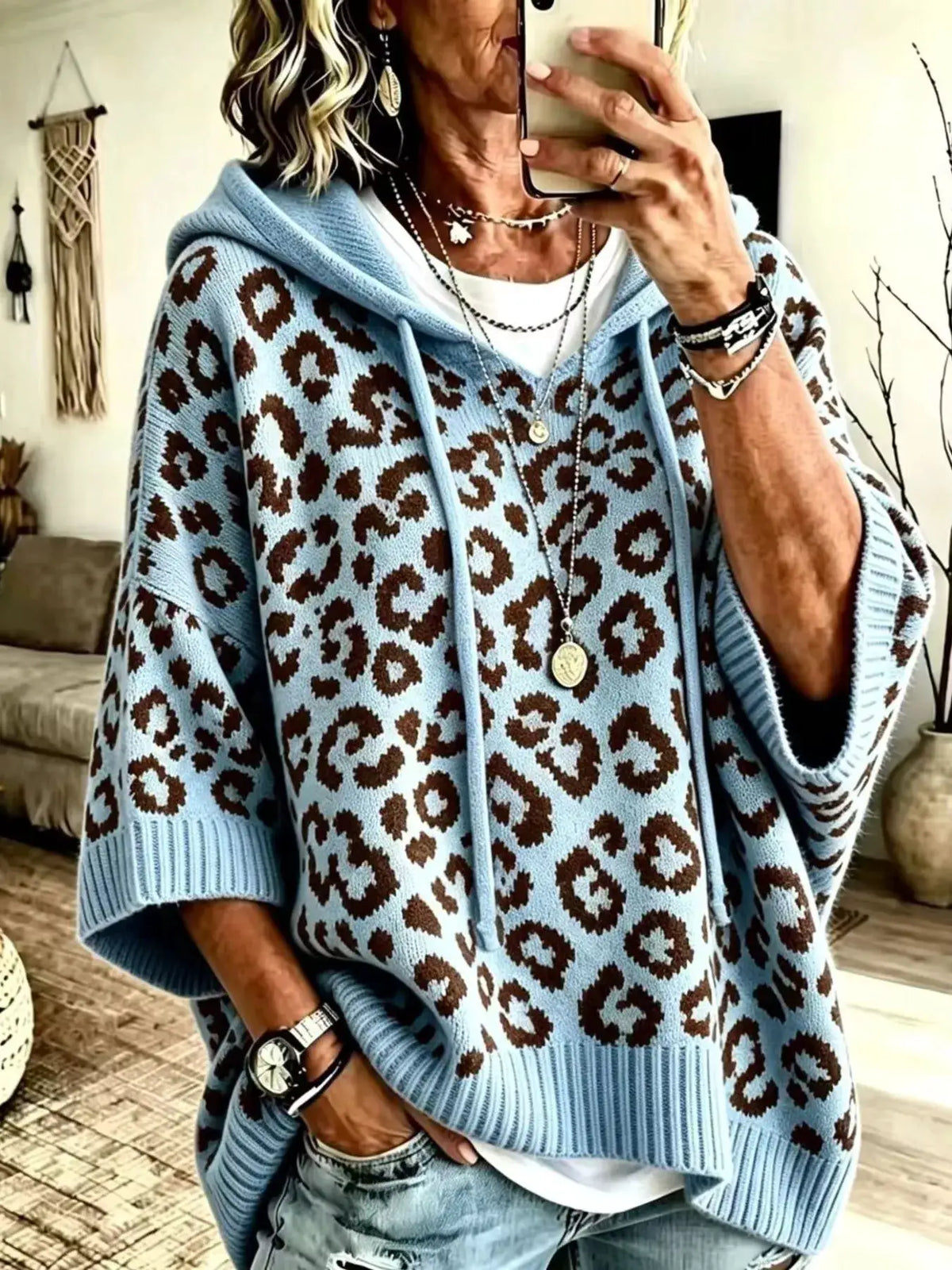 Drawstring leopard-print hooded sweater in light blue knit.