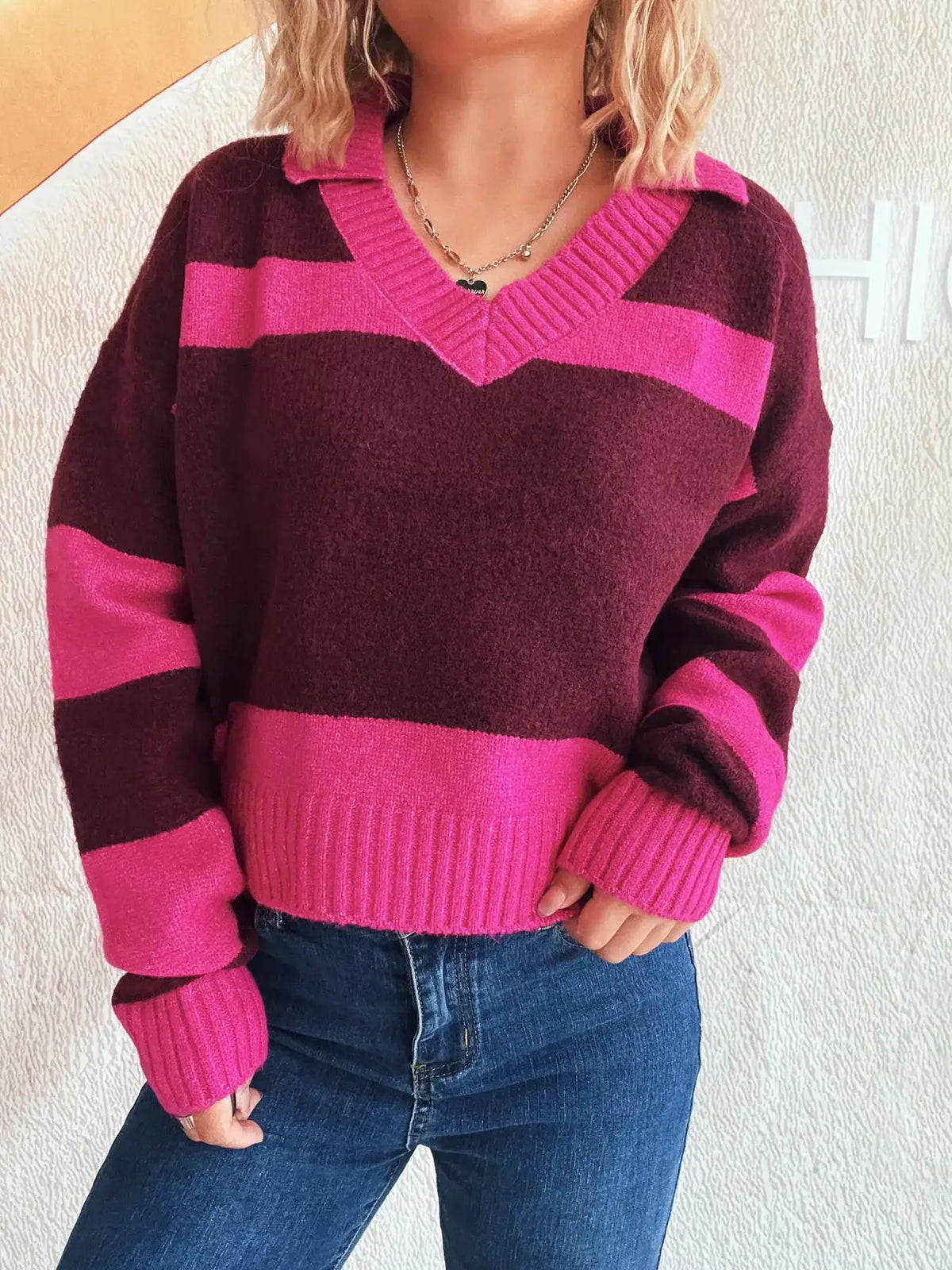 Color Block Long Sleeve Sweater in pink and burgundy stripes with a ribbed V-neck and soft stretch polyester blend.