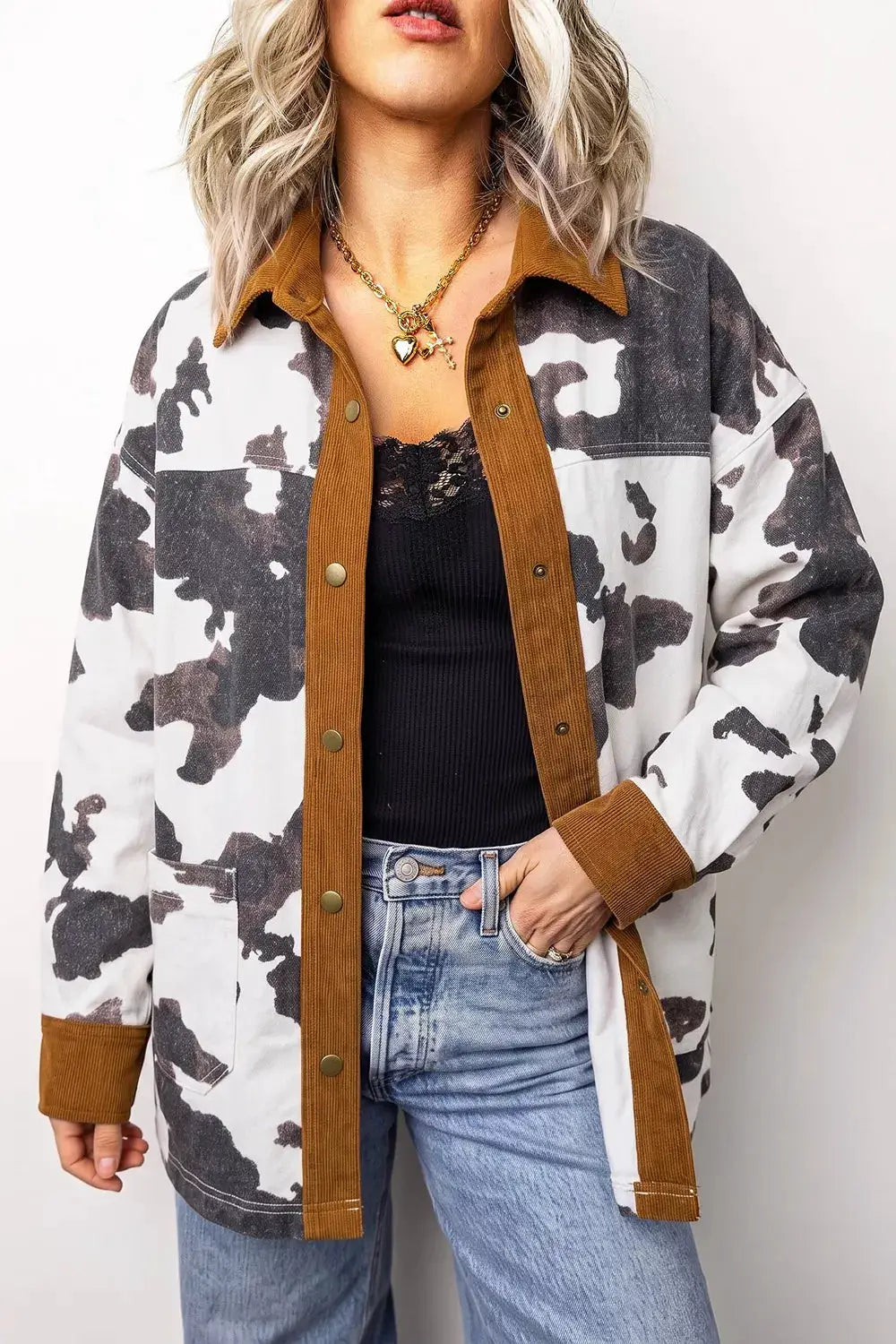 Multi-color western cow-print denim jacket with brown corduroy trim and button front