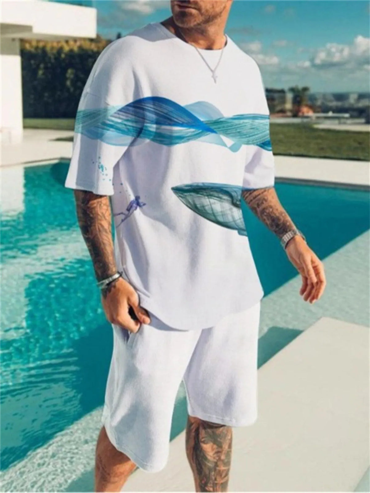Men's plus-size white short-sleeve top and shorts set with blue wave print by Trendsi