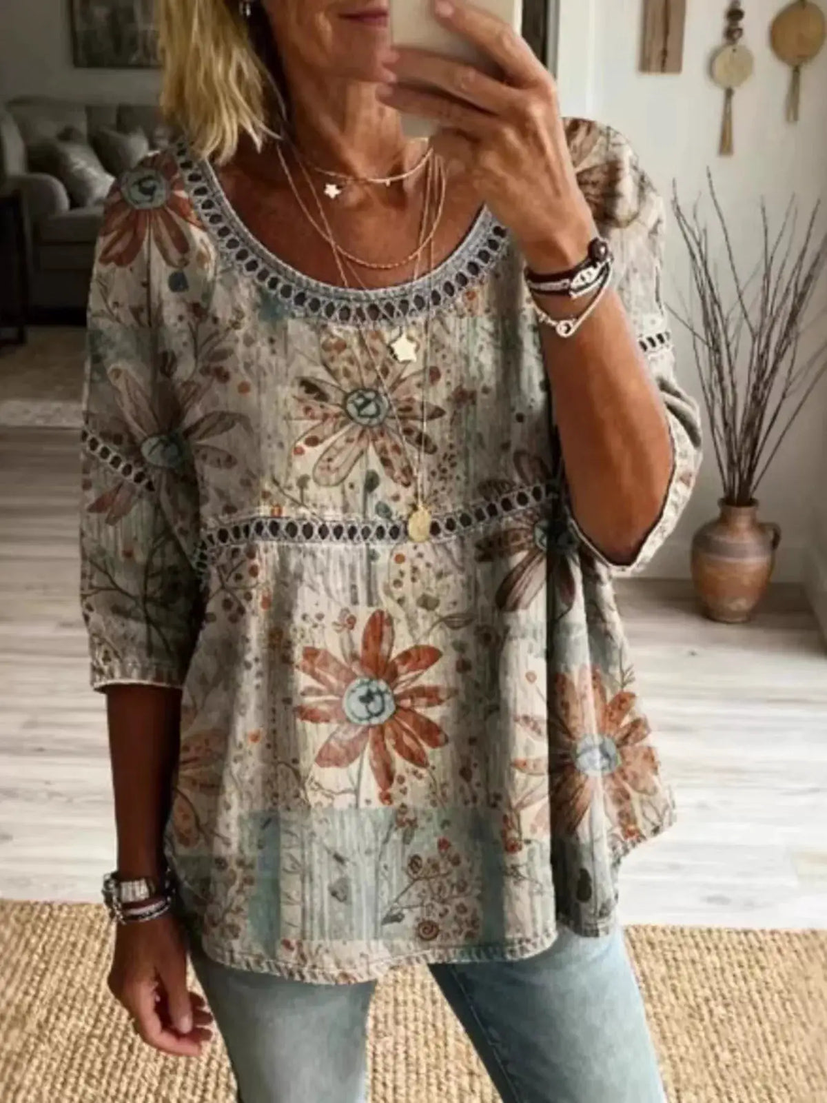 Plus-size hollow-out round-neck top with floral print