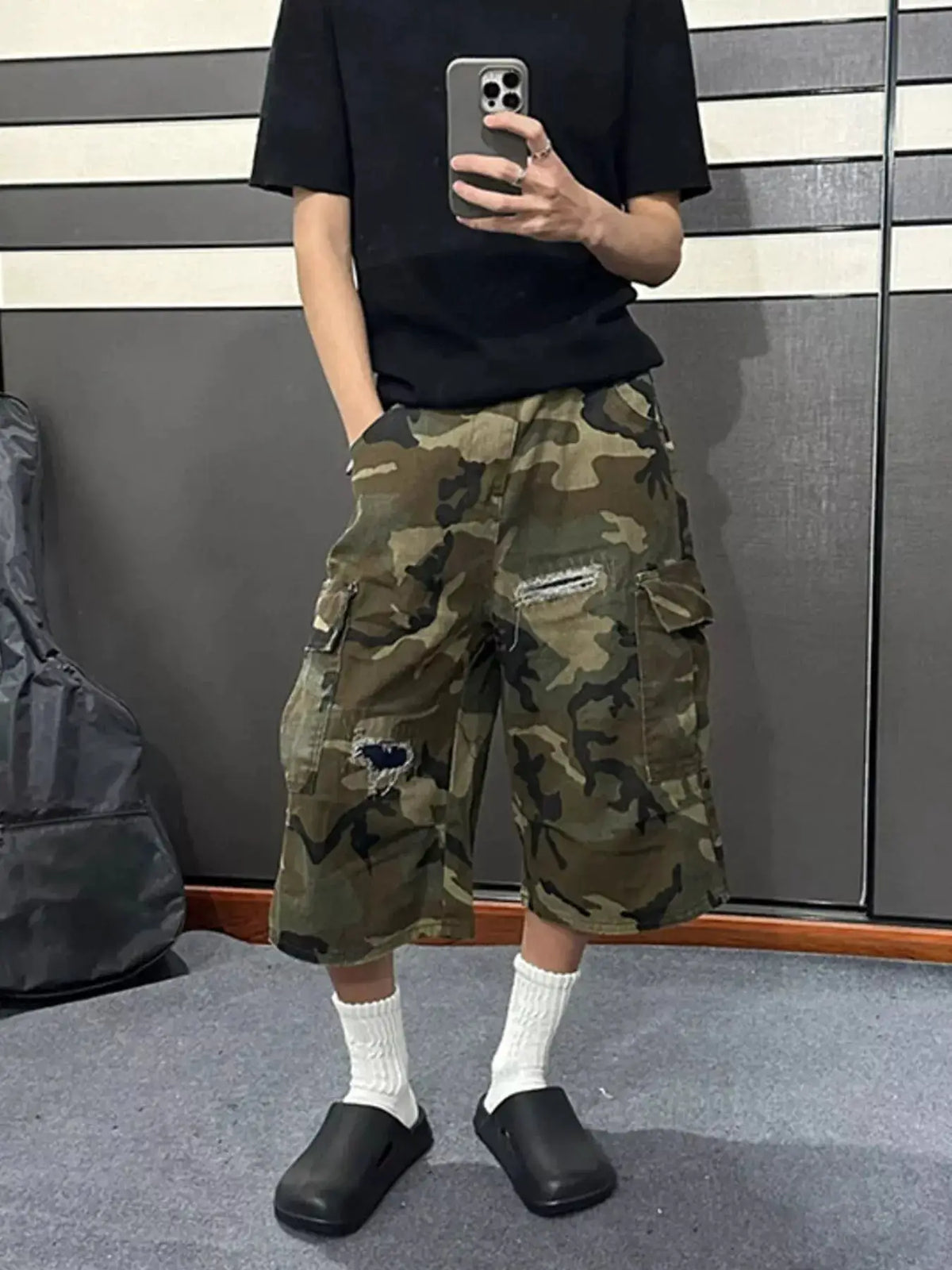 Mens plus-size camo cargo denim shorts with distressed details