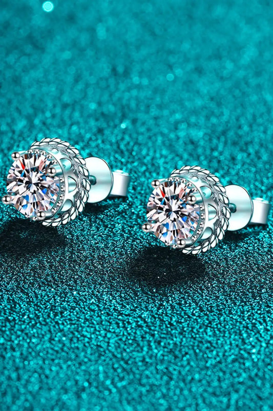 Pair of 1 Carat Moissanite Rhodium-Plated Round Stud Earrings with braided halo in silver-tone.