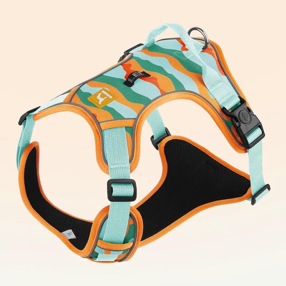 AdTec dog harness with chest and back straps, camouflage pattern, orange trim and teal webbing