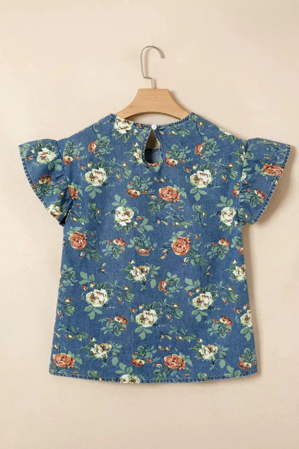 Ruffled short-sleeve floral denim top for women, blue with white and orange blooms; casual blouse