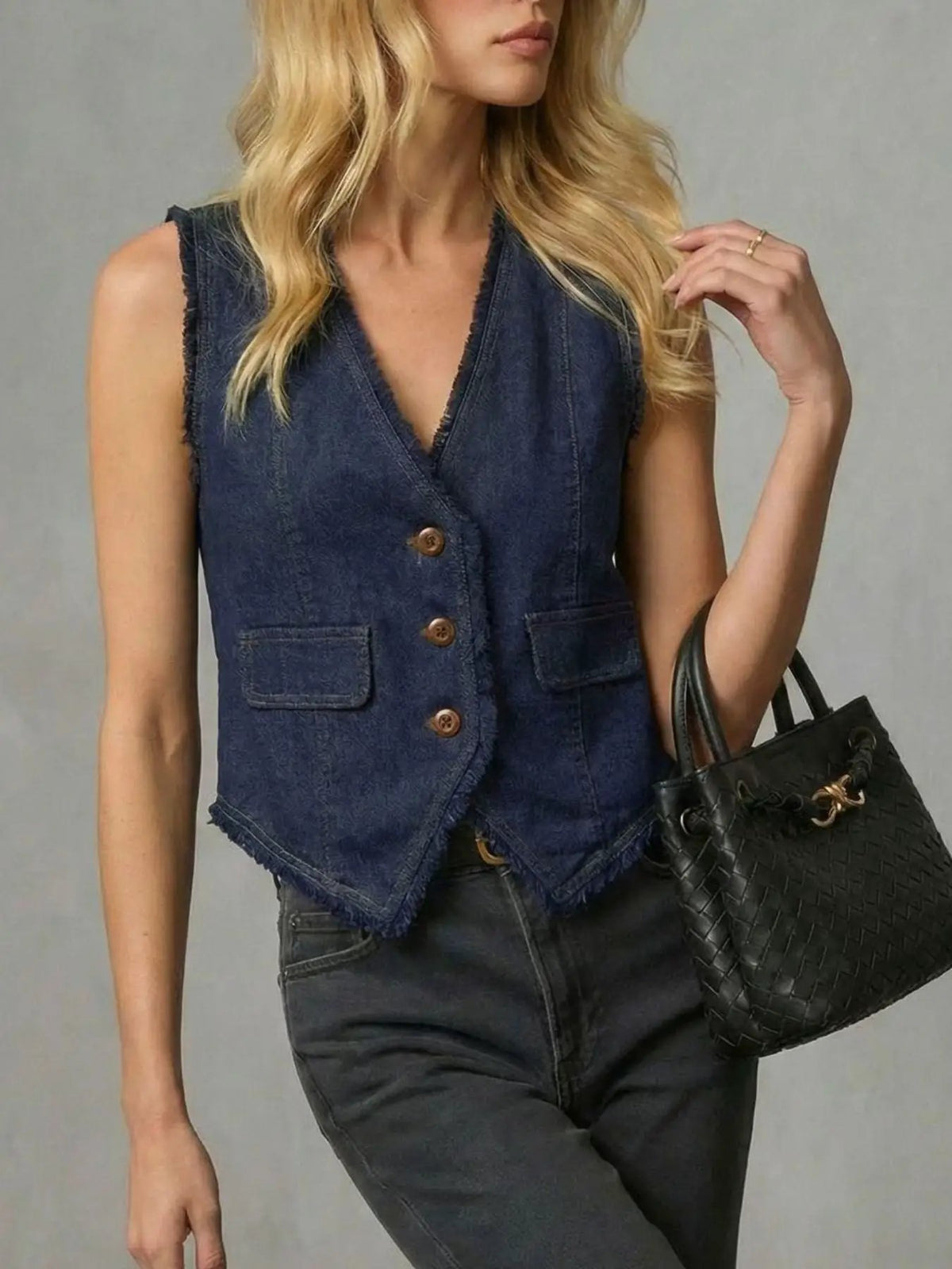 Womens frayed-hem denim vest with button front and side pockets in dark indigo, Trendsi.