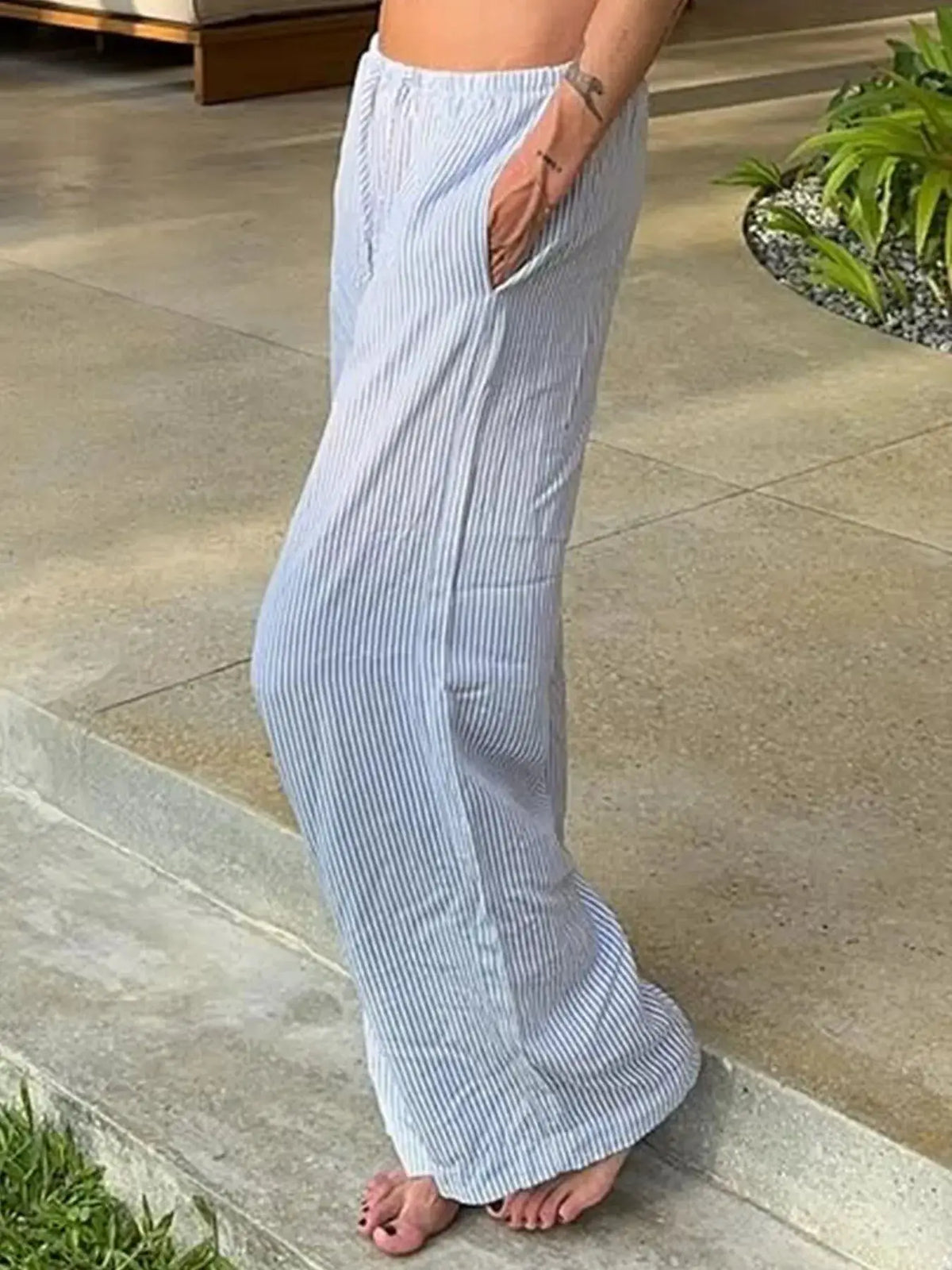Striped drawstring wide-leg palazzo pants by Trendsi, blue and white.