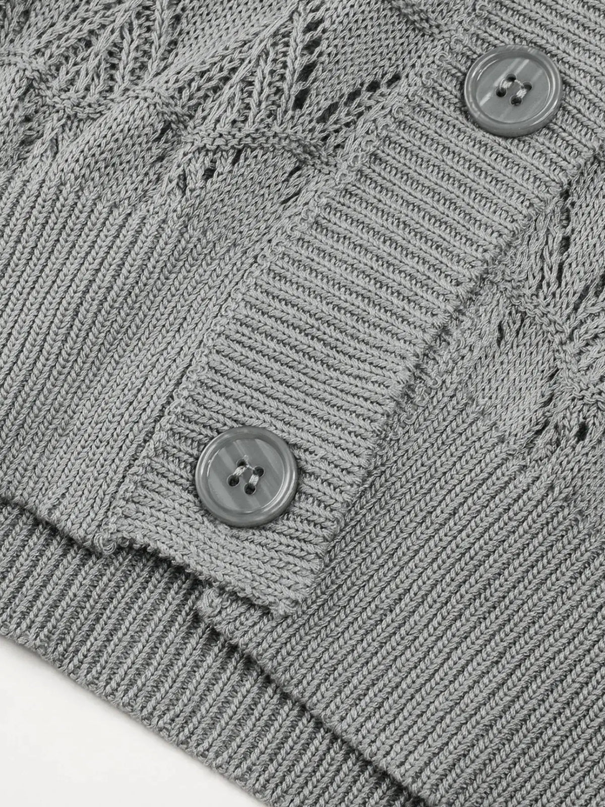 Button front openwork cardigan in gray with textured stretch detail and visible buttons