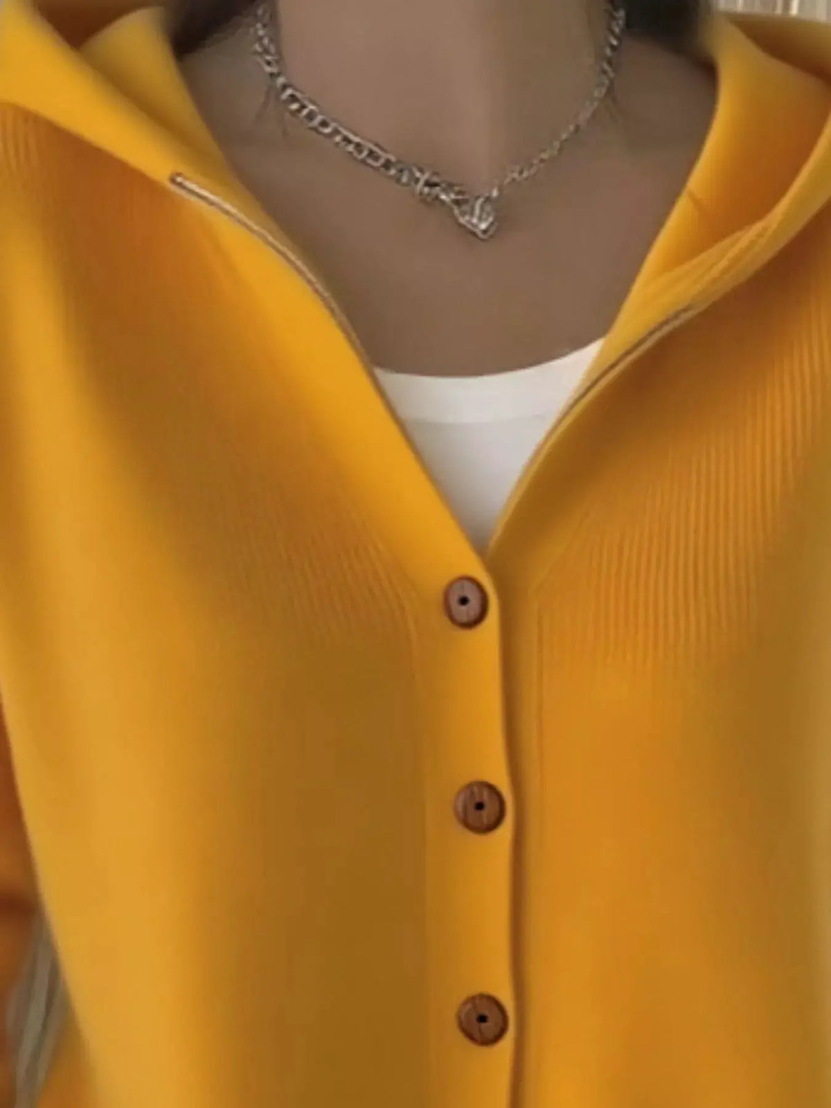 Plus-size yellow knit cardigan for women with front button closure