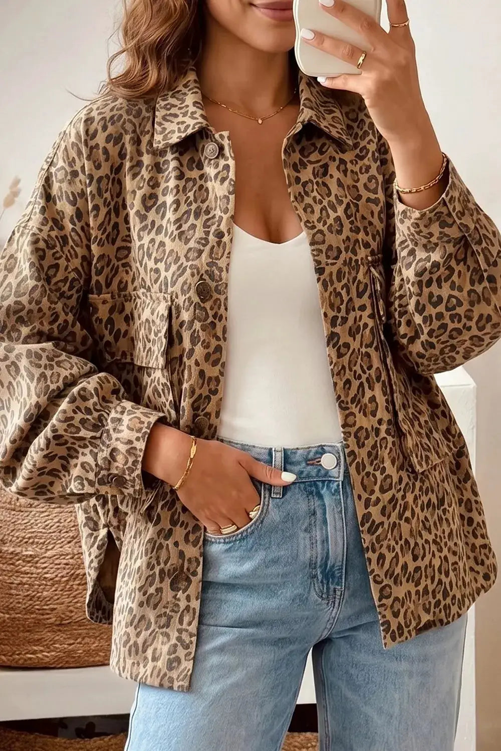 Casual leopard print denim trucker jacket by Trendsi with button front and side pockets