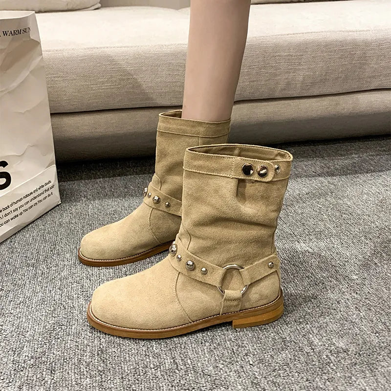 Shoes: Studded suede mid-calf harness boots in beige with silver studs and buckled straps.