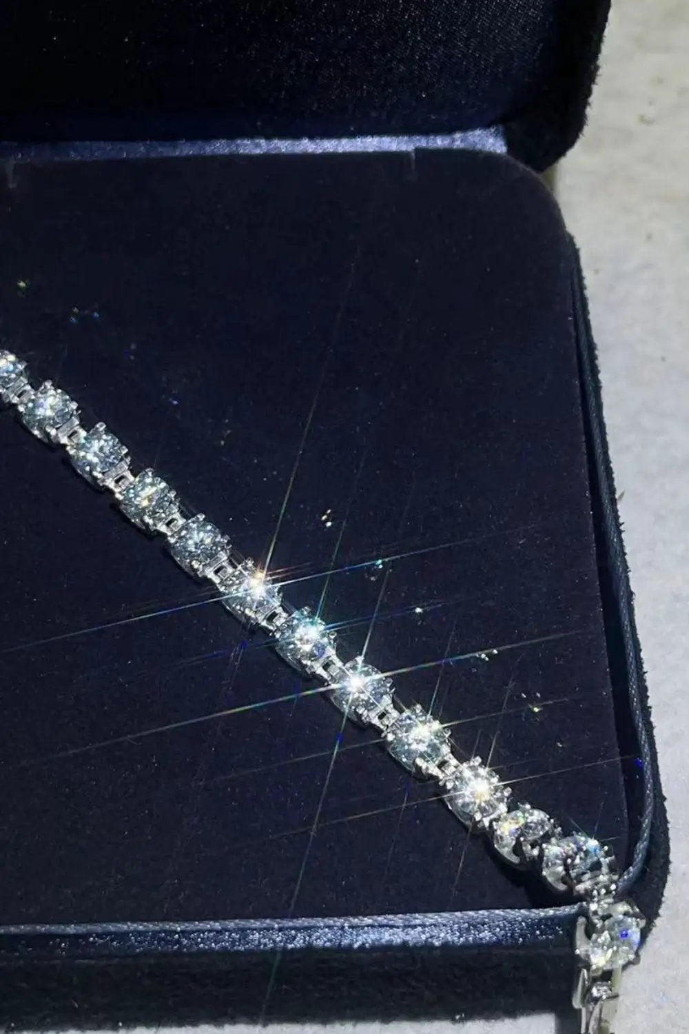 10 Carat Moissanite platinum-plated bracelet in a black velvet jewelry box