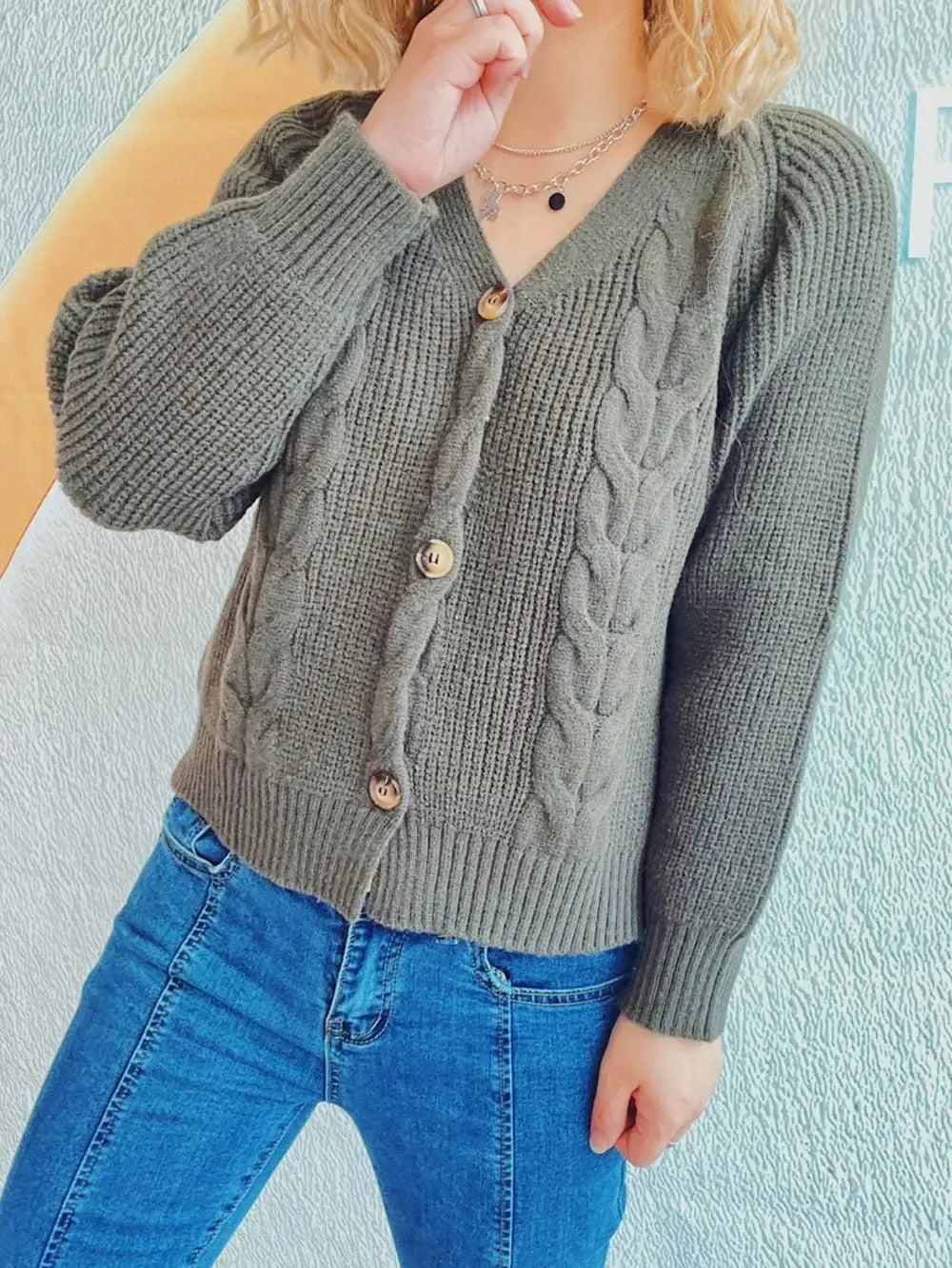 Soft cable knit V-neck button-front cardigan in gray with long sleeves