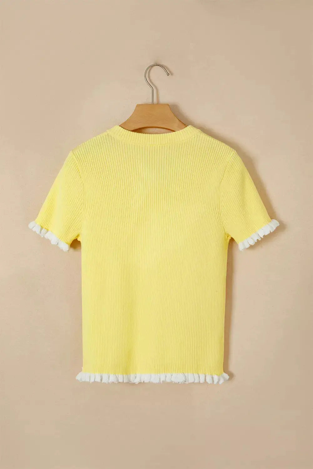 Yellow short-sleeve ribbed knit cardigan with white frill edges on sleeves and hem