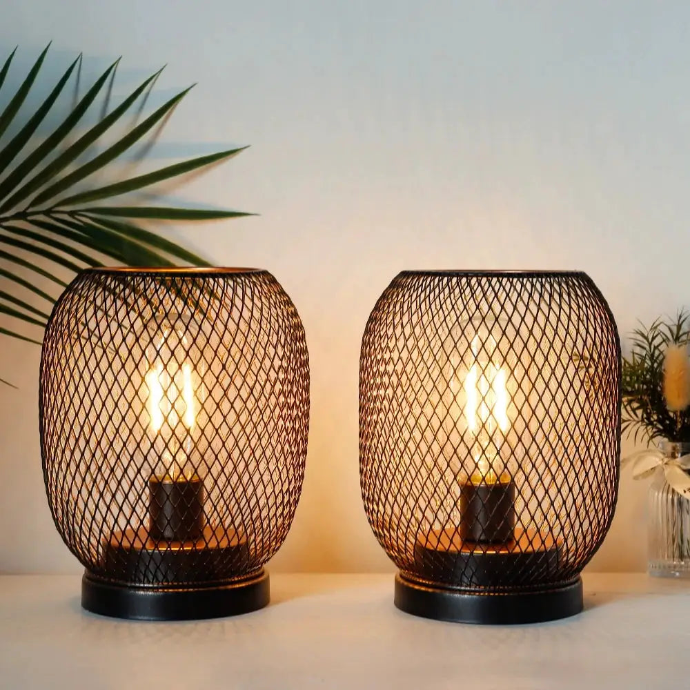 Set of 2 tall outdoor table lamps, battery-powered, with dark bronze metal mesh cages and black bases