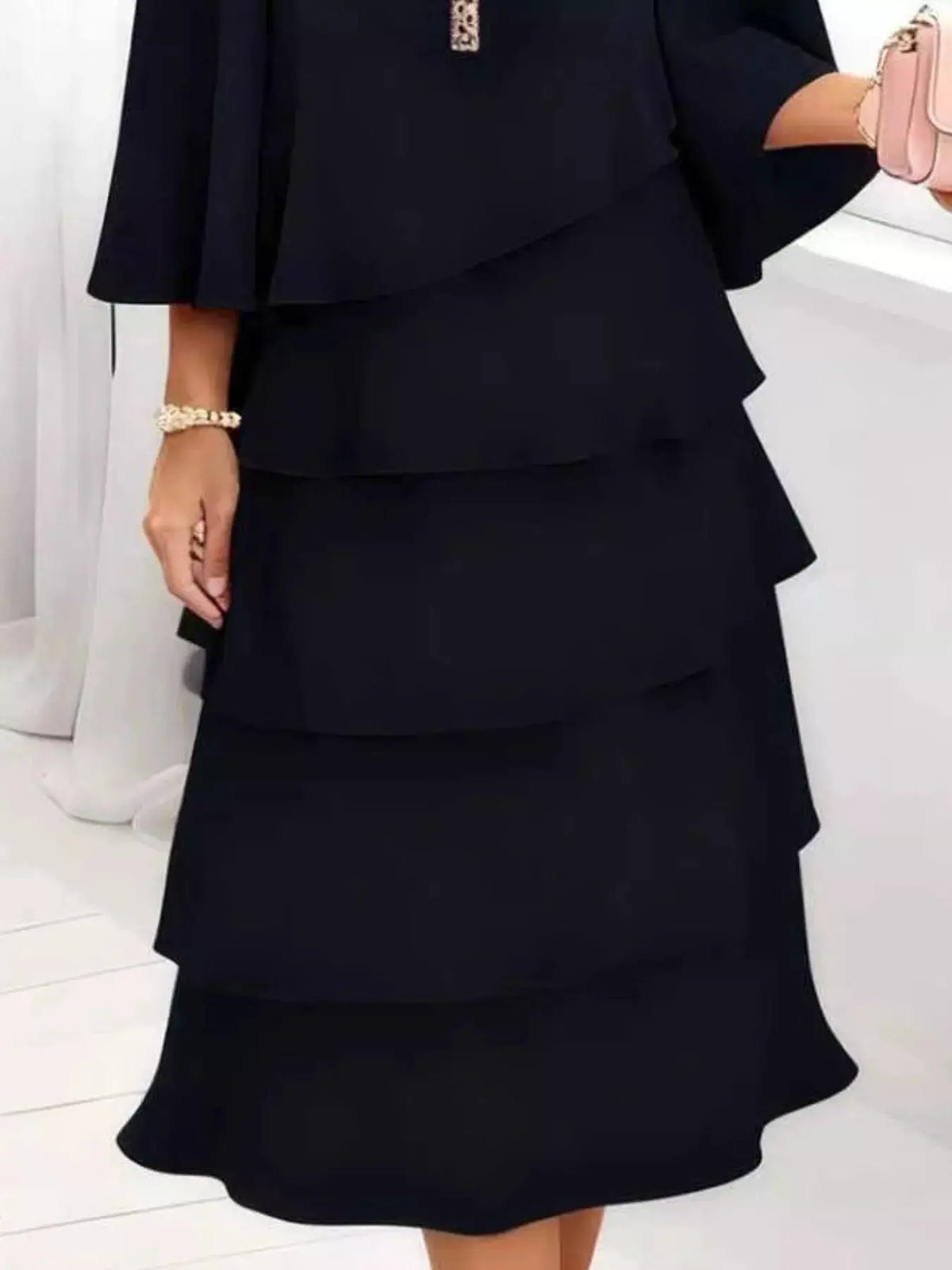 Trendsi plus-size black ruffled layered dress with 3/4 sleeves