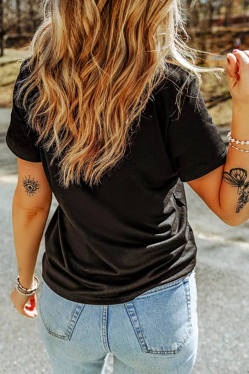 Full Size Halloween Ghost Applique Short Sleeve T-Shirt Plus Size, black, back view of model wearing light-wash jeans.