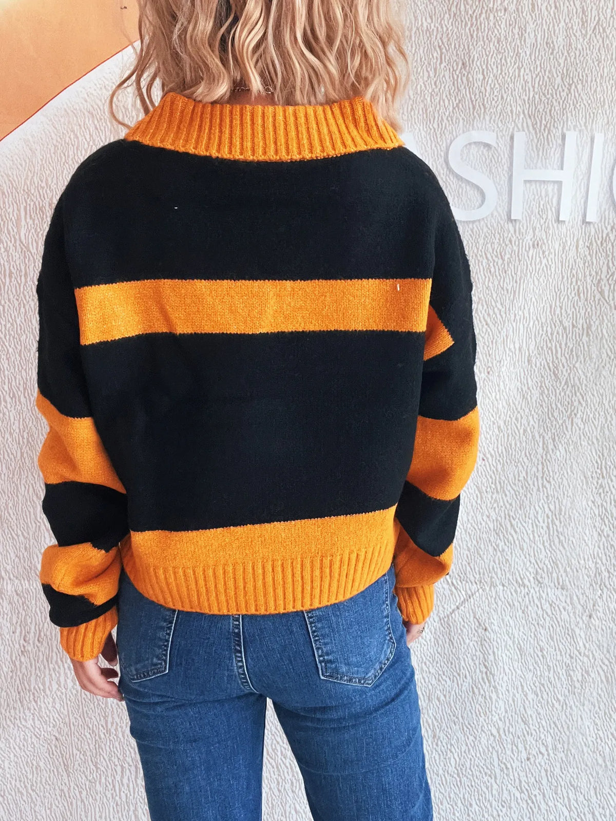 Color Block Long Sleeve Sweater With Soft Stretch Polyester Blend in black with orange stripes and orange rib collar