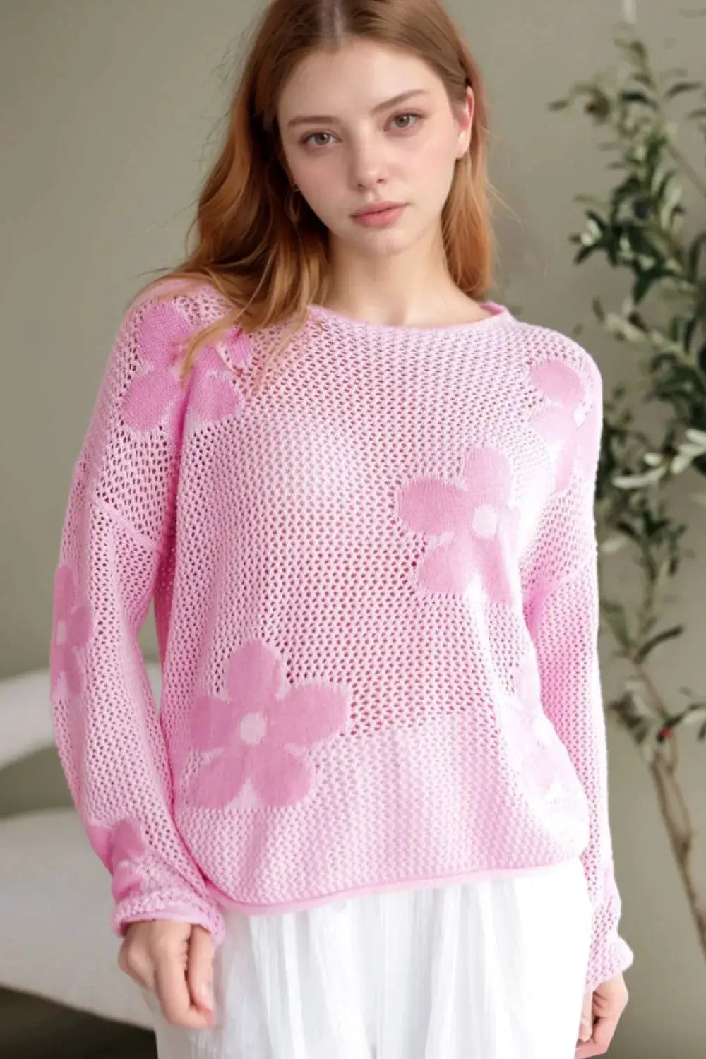 Lightweight pink openwork floral knit cover-up top with large floral motifs and round neck