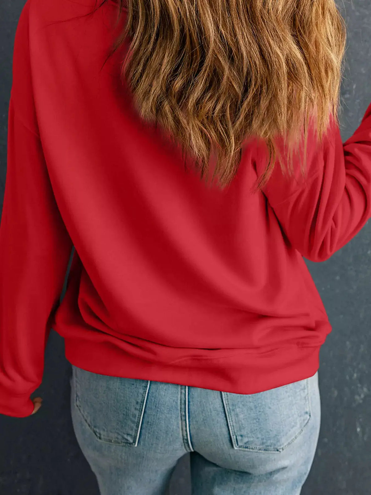 Western Patchwork Cow Drop Shoulder Sweatshirt in red with a relaxed drop-shoulder fit