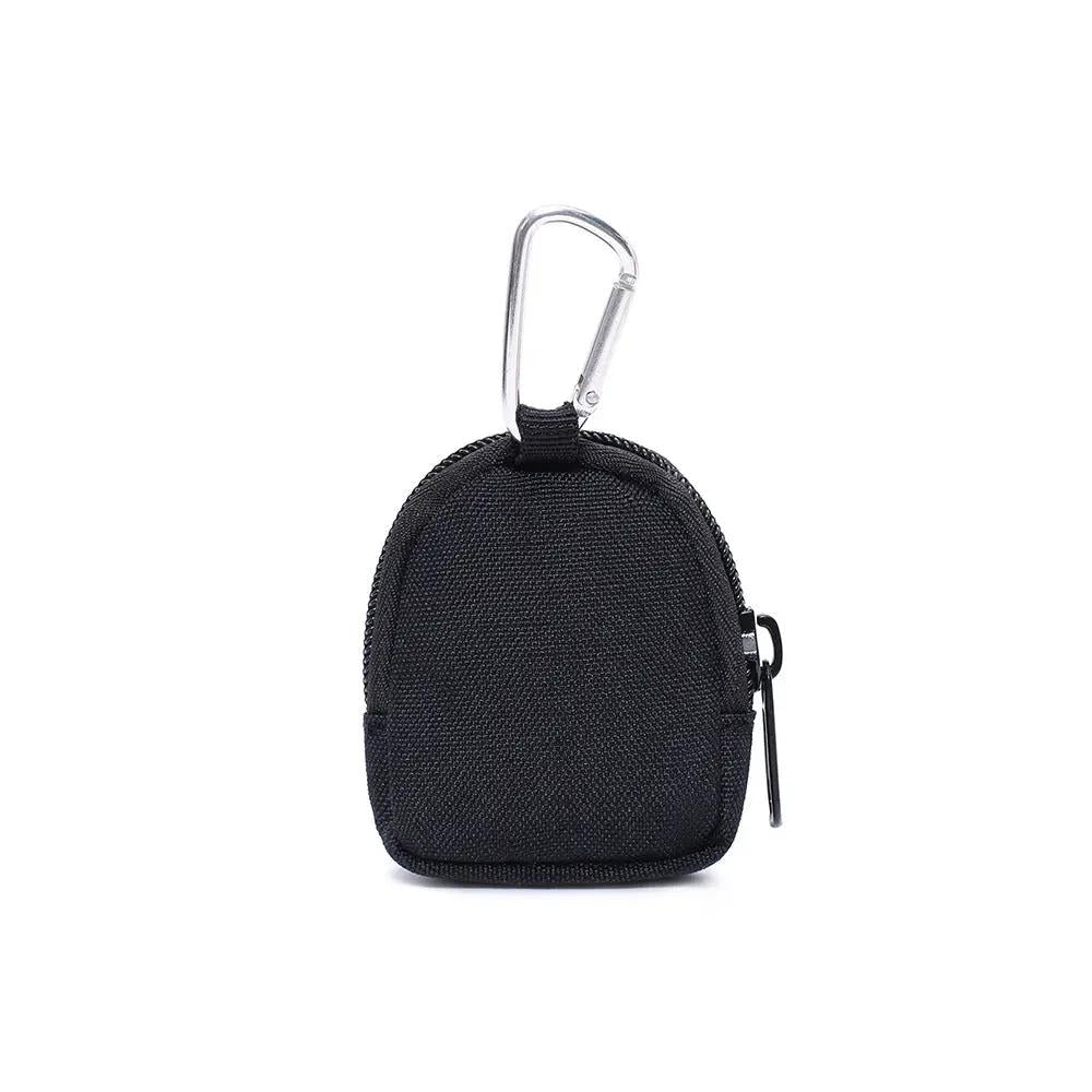 Small black zippered pouch with metal carabiner clip for outdoor gear storage