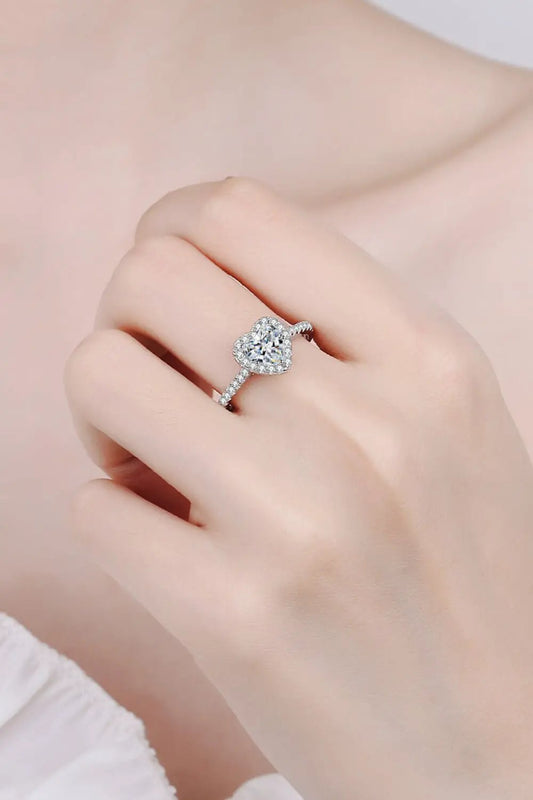 1 Carat Moissanite Heart-Shaped Ring with halo and pavé band on a silver-toned metal setting