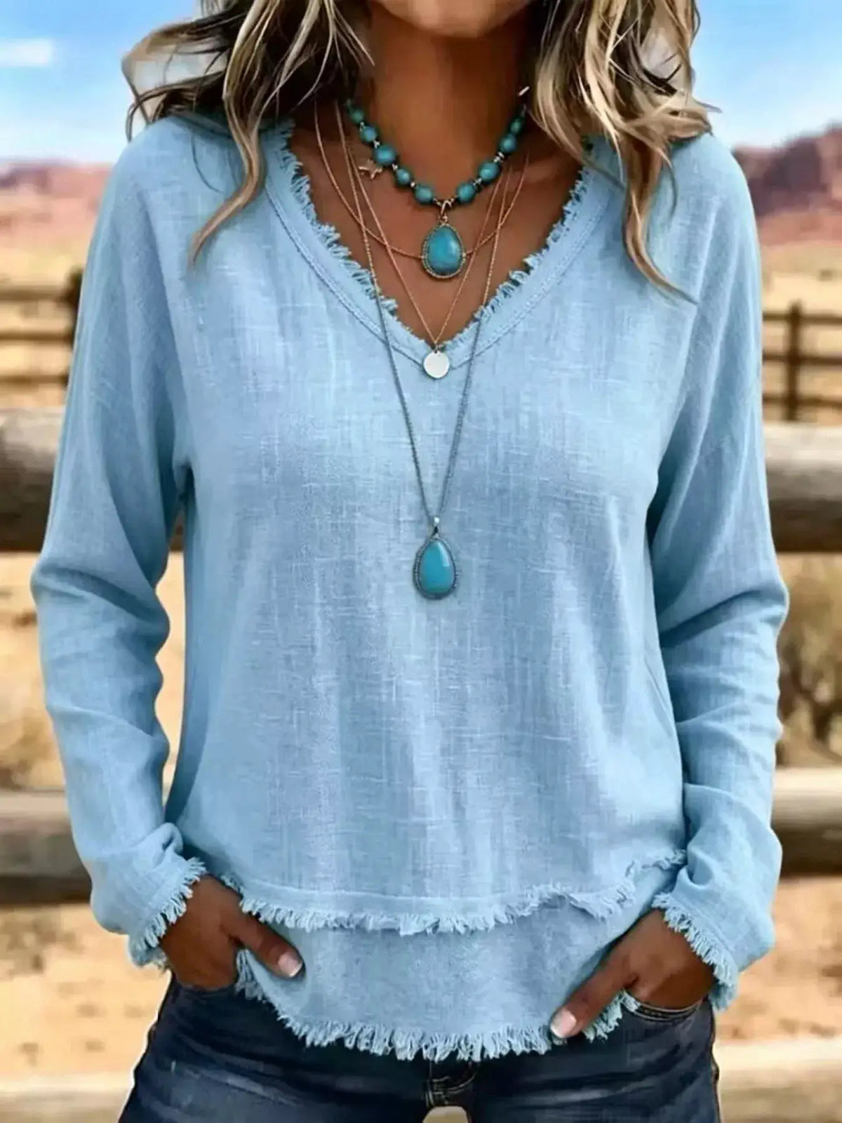 V-Neck Frayed Hem Long Sleeve T-Shirt in light blue chambray
