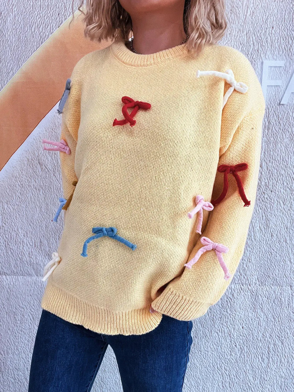 Trendsi yellow bow-accent round-neck sweater for women, knit pullover with colorful bows along sleeves