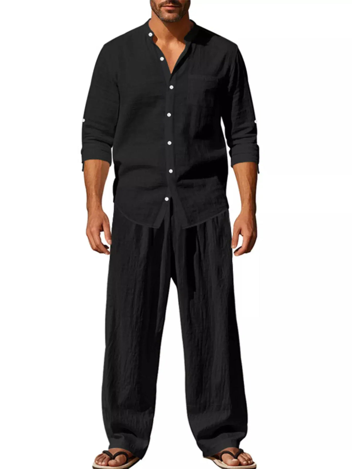 Men's casual linen-blend button-front shirt and pants set in black, with rolled sleeves and wide-leg pants.
