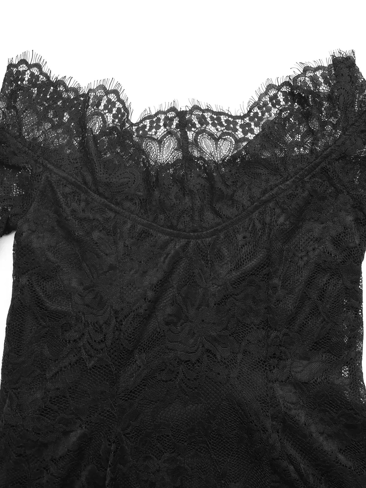 Lace off-shoulder mini dress in black with scalloped edges.
