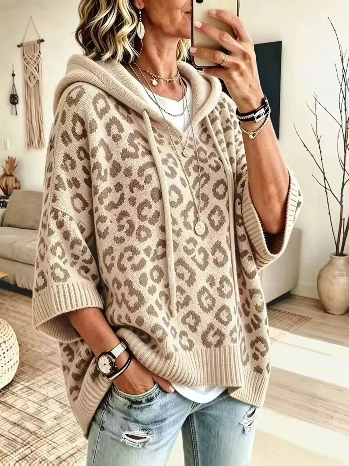 Drawstring leopard print hooded sweater in beige knit with an oversized relaxed fit