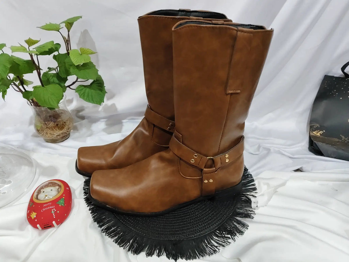 Vintage AdTec cowboy boots in brown leather with knee-high shaft and studded strap details