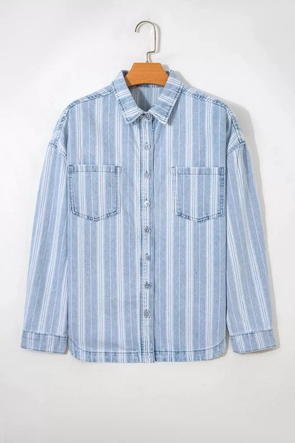 Striped light-blue denim shacket with chest pockets and button-down front