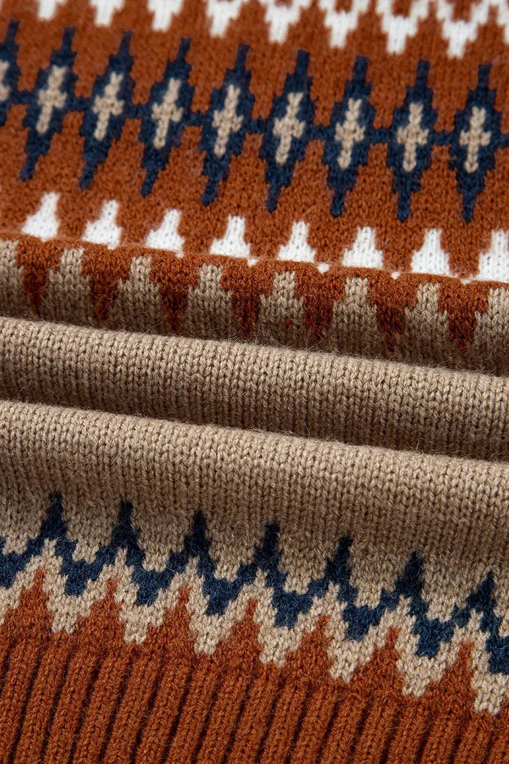 Geometric Pattern Long Sleeve Sweater in rust, navy, and cream knit