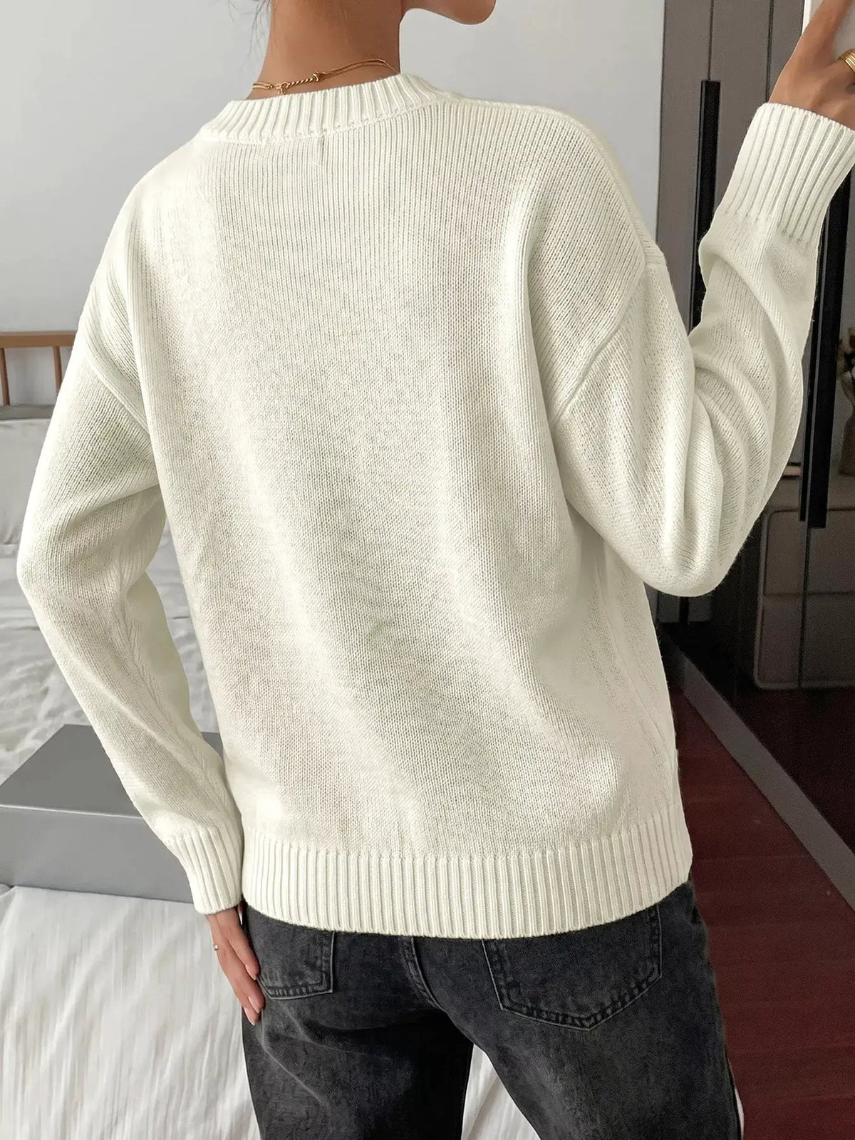 Bow Graphic Round Neck Acrylic Sweater cream color with ribbed cuffs and hem, soft stretch fit