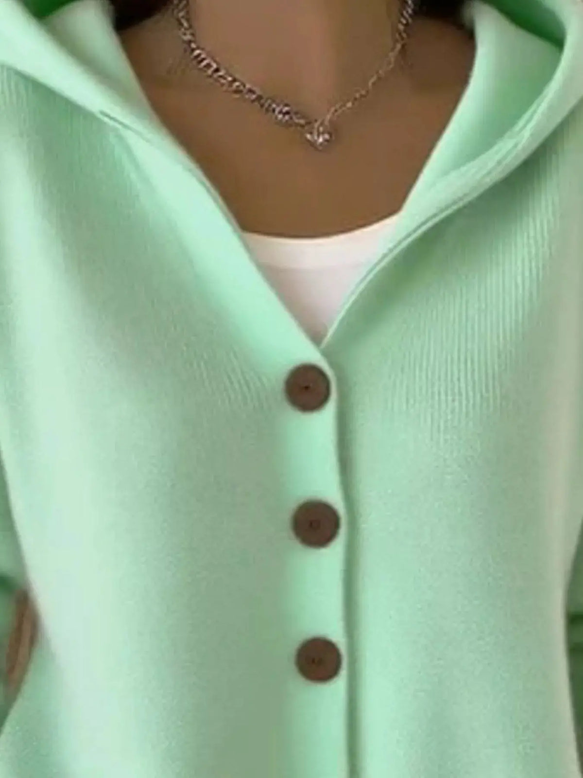 Plus-size knit cardigan button-front in mint green with brown buttons
