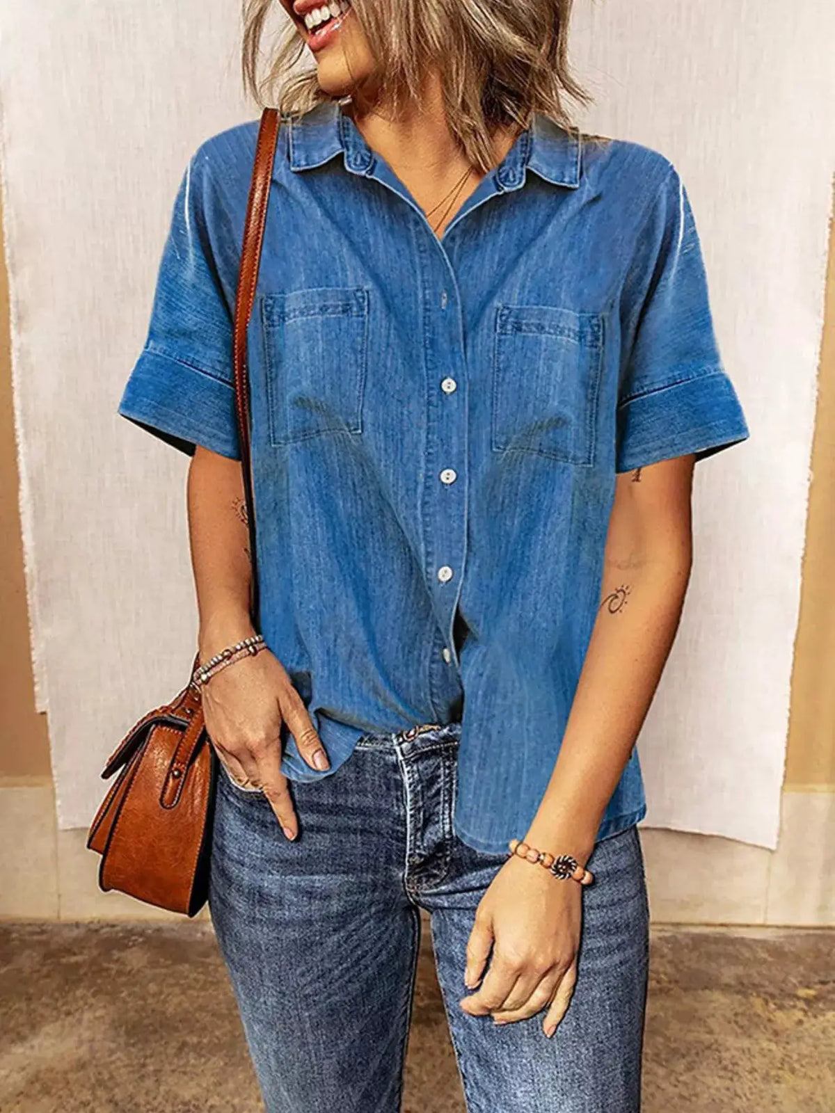 Denim short-sleeve shirt by Trendsi, light blue with chest pockets.