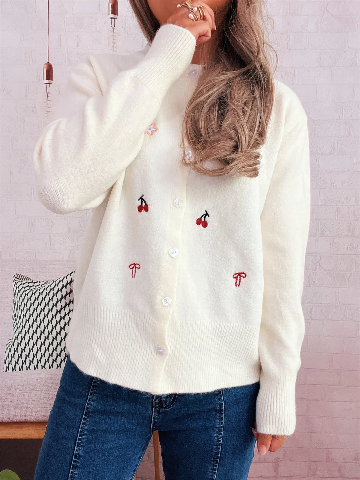 Cream ribbed knit cardigan with button-front and embroidered cherries