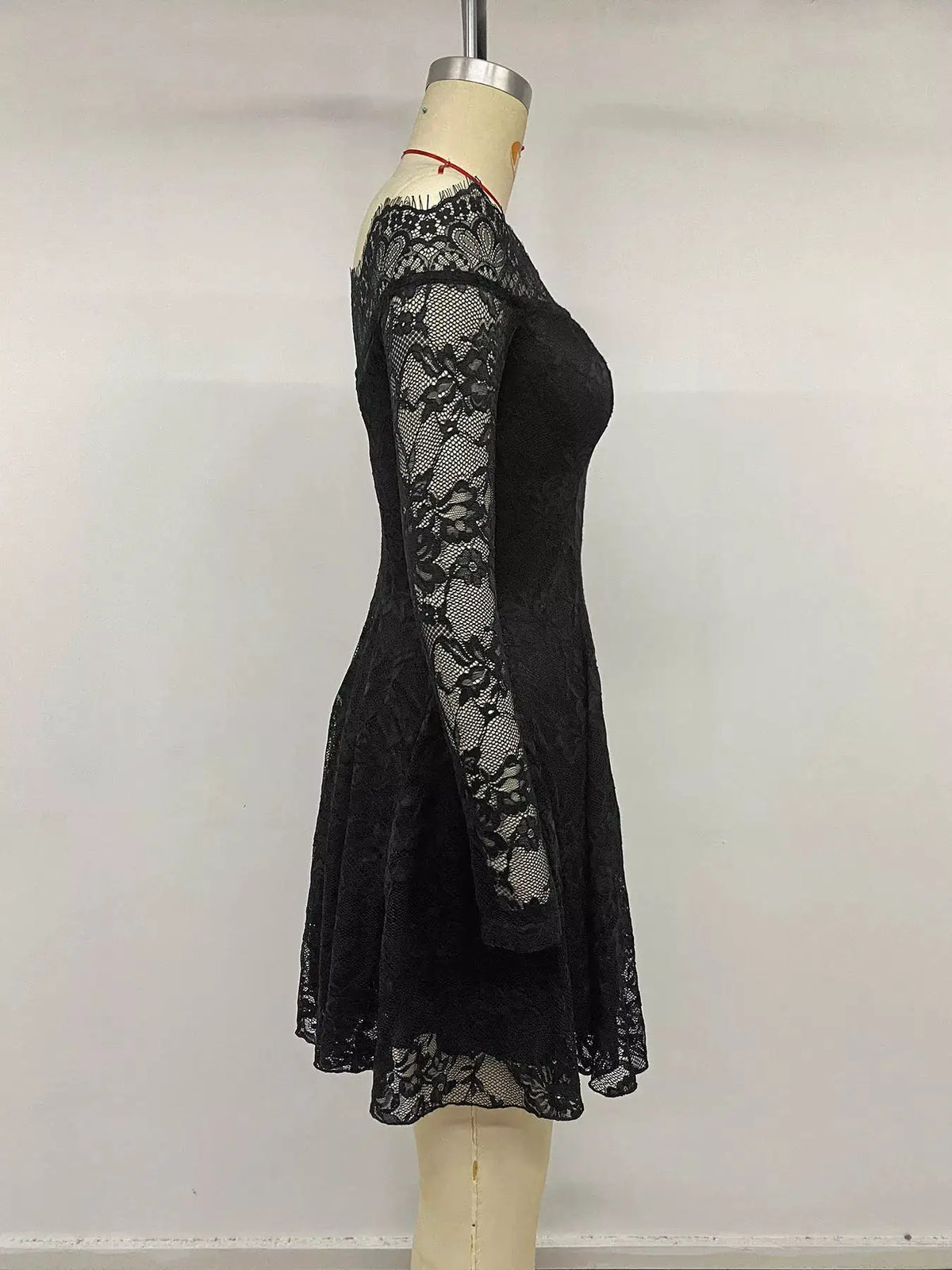 Lace off-shoulder mini dress in black with long lace sleeves by Trendsi