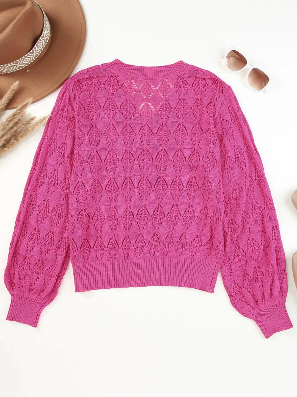 Button-front openwork cardigan by Trendsi in bright pink with textured stretch knit and ribbed cuffs
