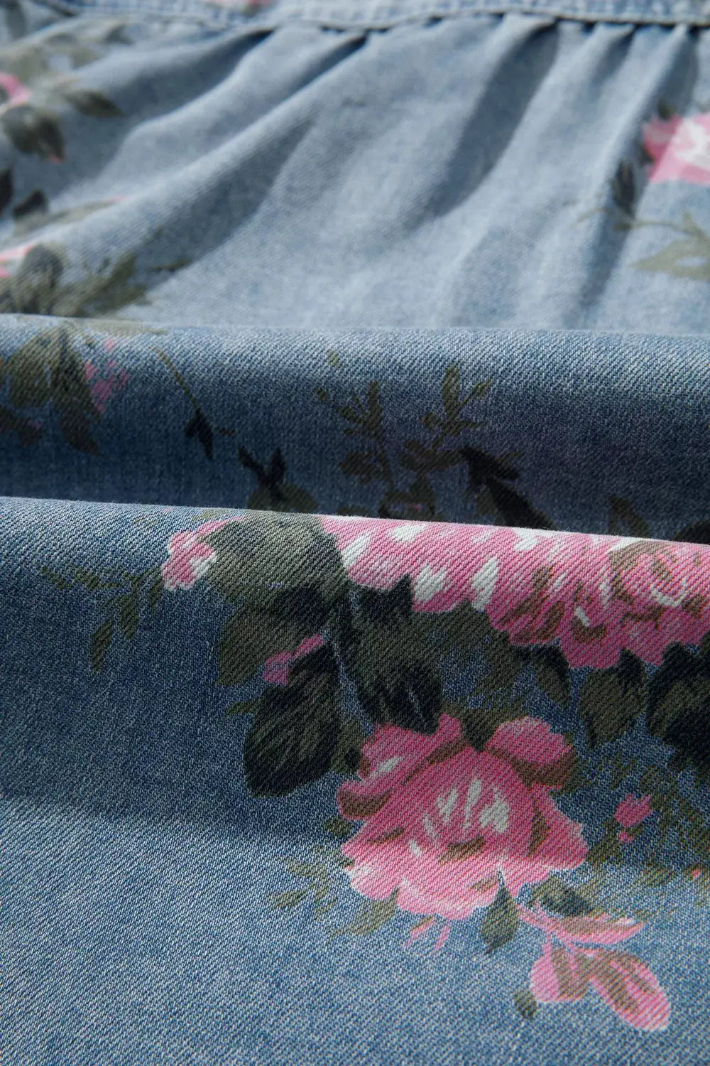 Floral print denim shirt; blue denim with pink flowers, cotton blend, button-up top