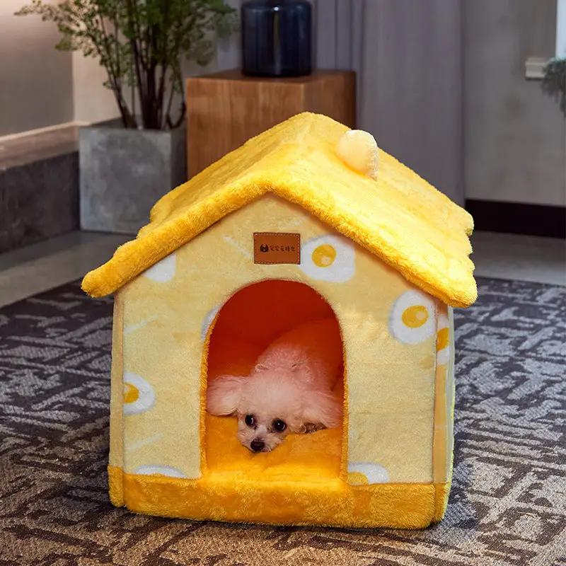 Foldable AdTec dog house bed in yellow plush with enclosed cave; small white dog inside