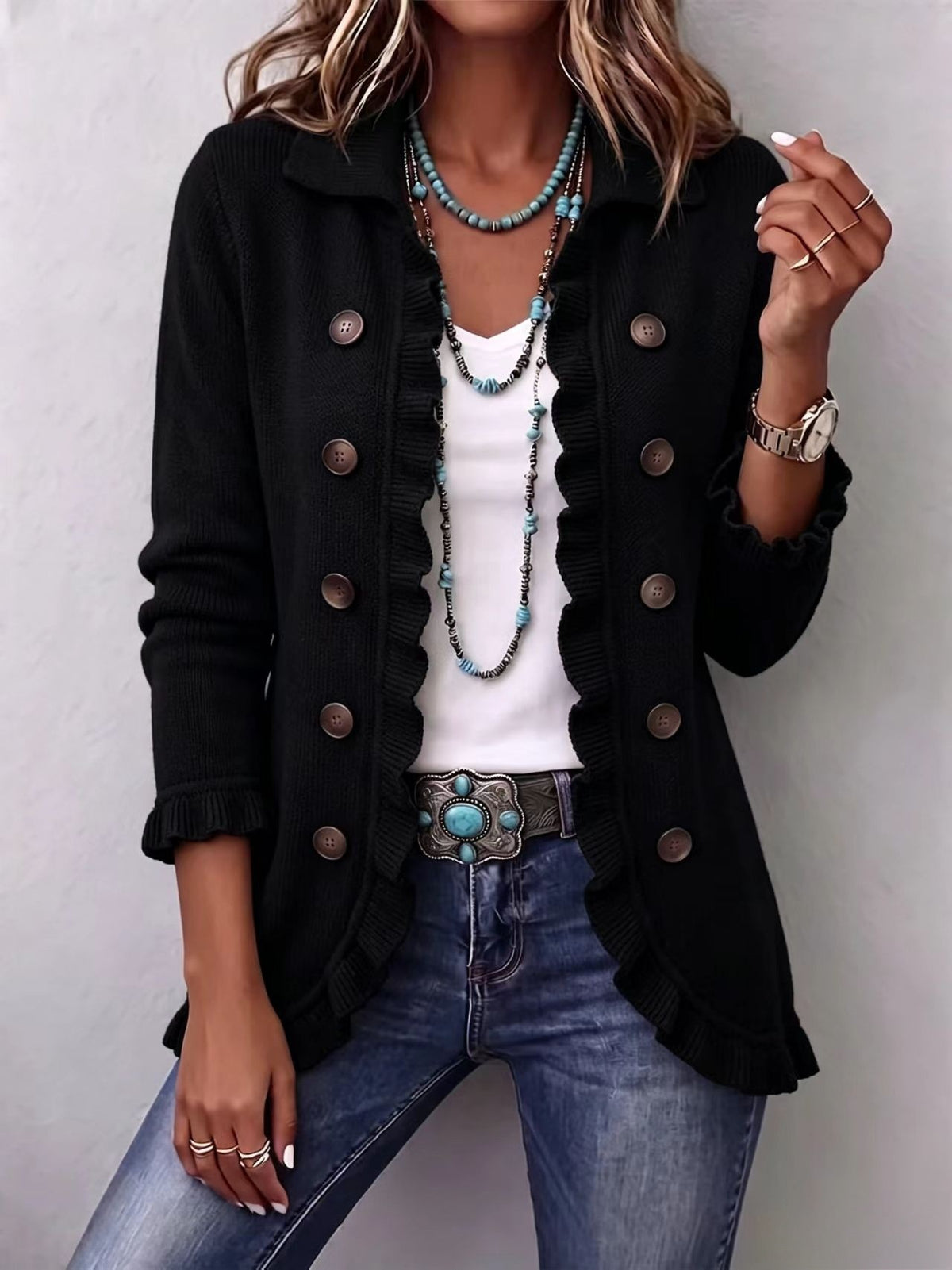 Long, Elegant Women's Cardigan in black knit with ruffled front trim and large brown buttons