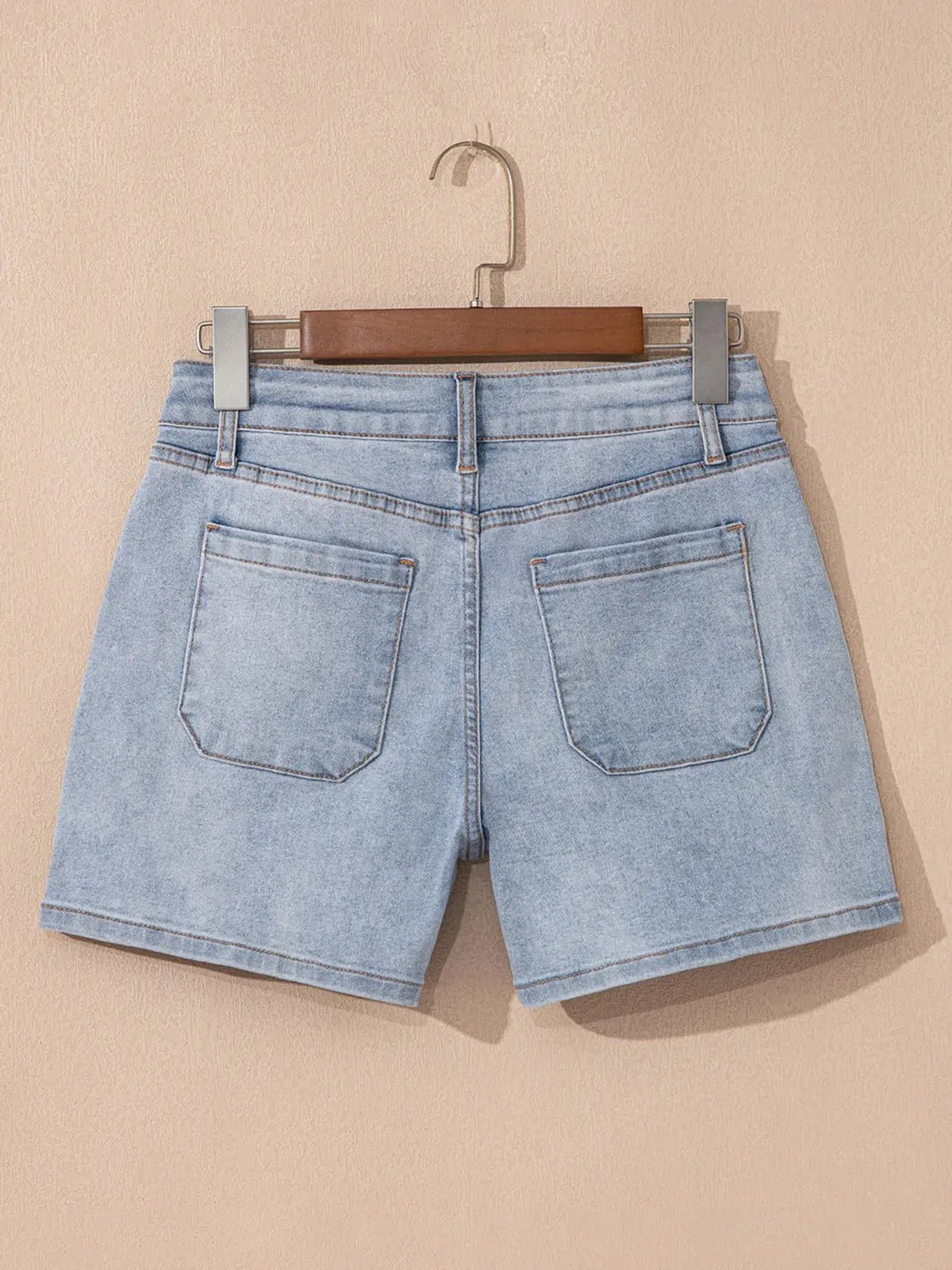 Wash High Rise Denim Shorts by Trendsi, light blue denim with back pockets.