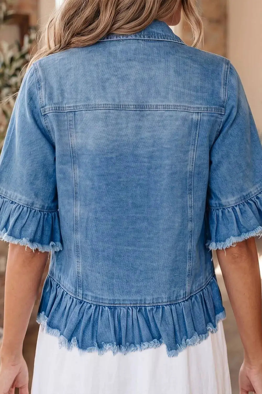 Womens Western denim jacket with raw-edge ruffle hem and half-sleeve ruffles in light wash