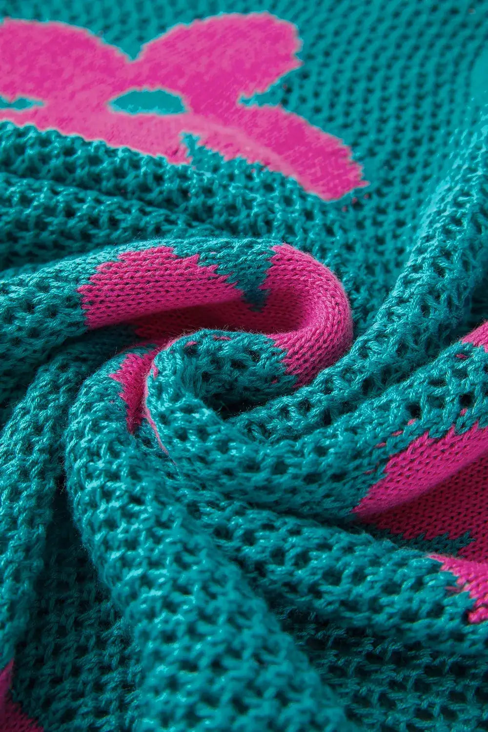 Lightweight openwork floral knit cover-up top in teal with pink accents