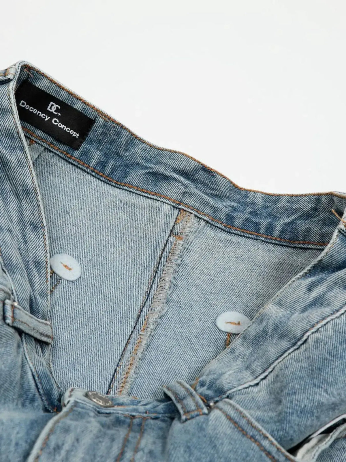 Mens oversized distressed denim shorts in light blue cotton-blend denim with Decency Concept tag