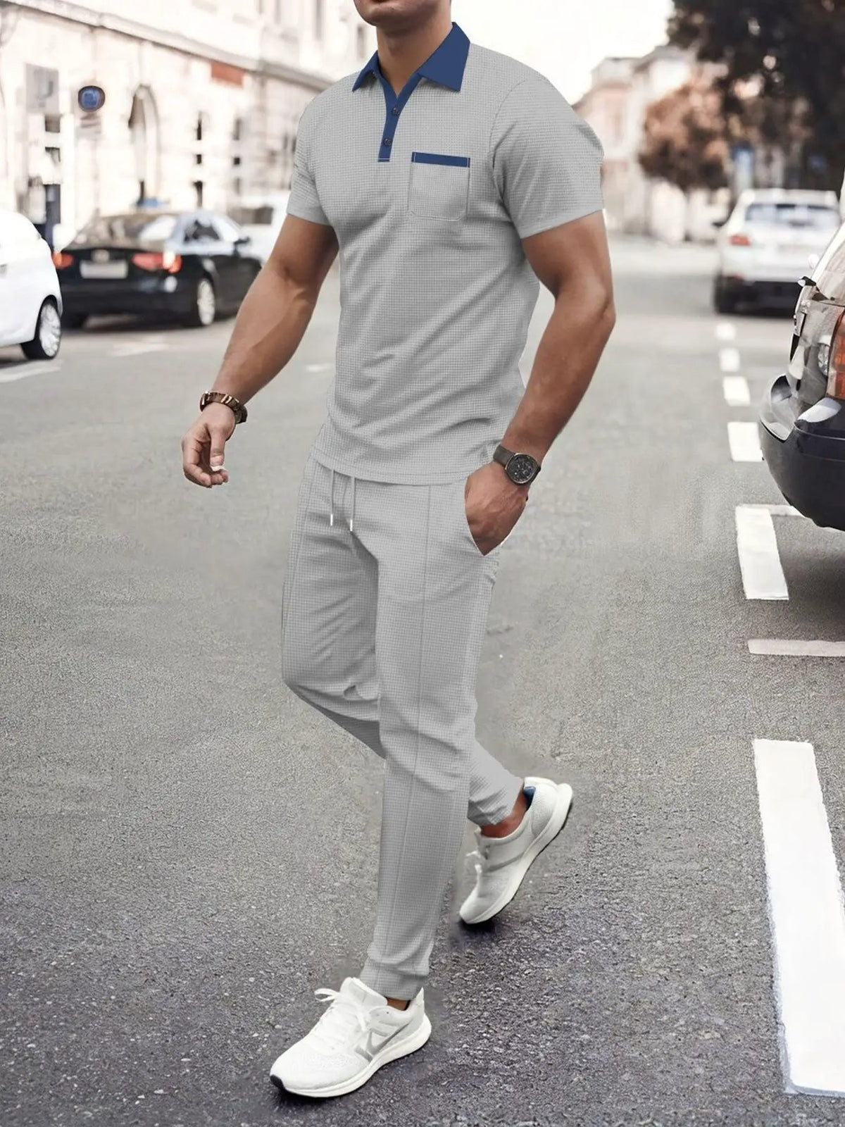Men's plus-size matching polo and pants set by Trendsi in light gray with blue collar and pocket trim